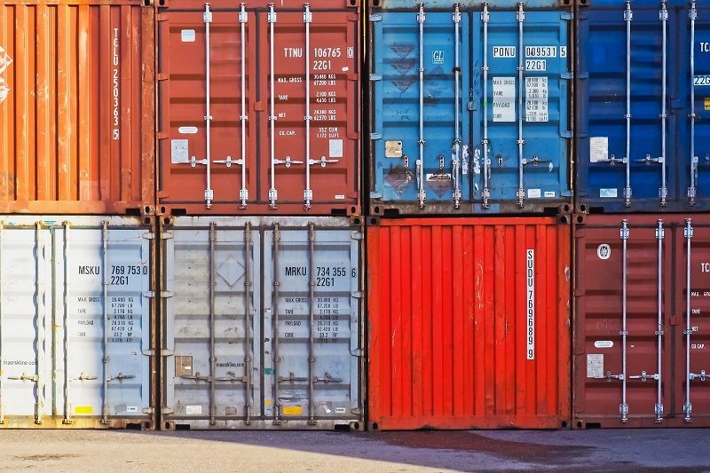 Colorful Shipping Containers | Learn questions to ask your international moving company from AW Transportation